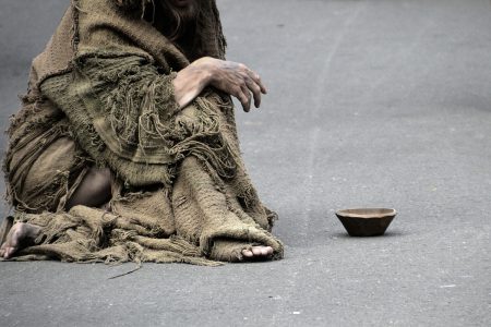 A beggar in rags