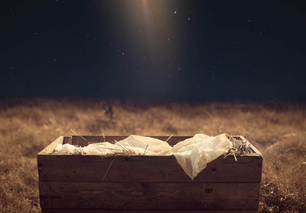 Matthew 2: Star of Bethlehem shining down on a manger